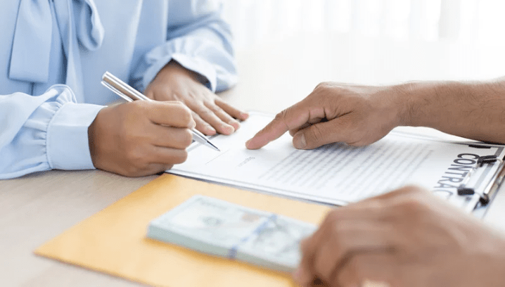 two hands working with SBA collateral requirements 